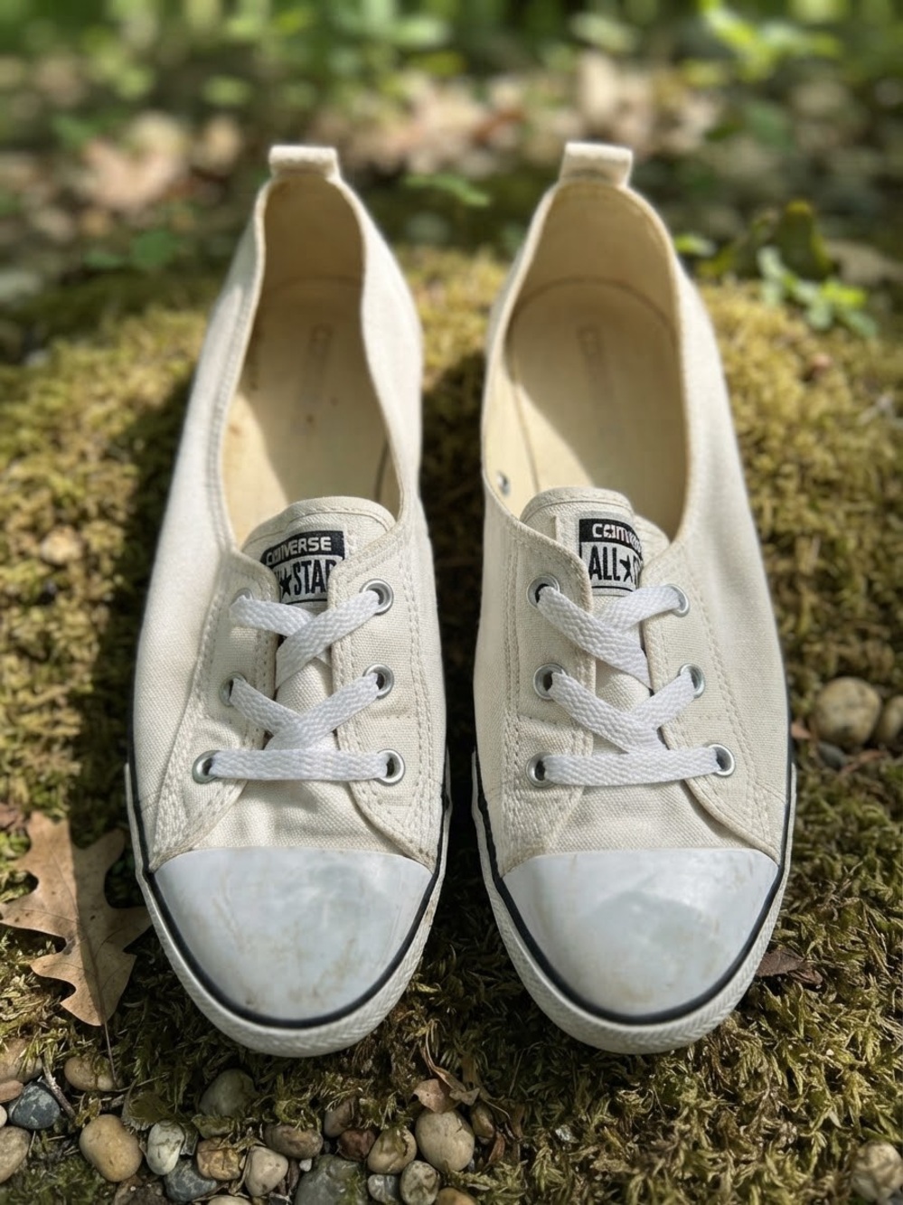 Converse Chuck Taylor All Star Ballet Lace Slip-On sneakers.